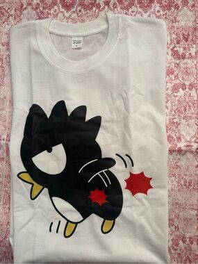 White Graphic Tee with Black Cartoon Character -
